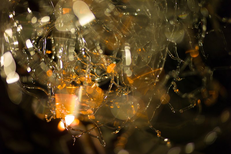 Light glimmering through a glass sculpture